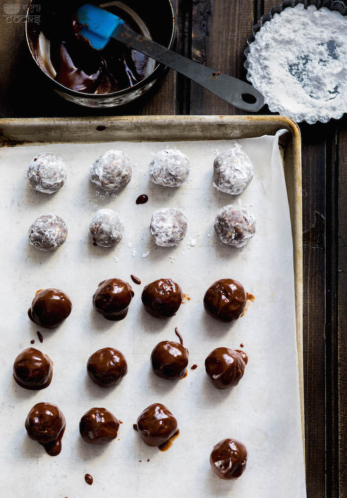 rum balls rolled in chocolate sauce